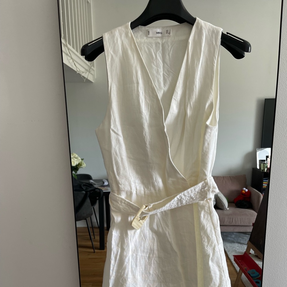 White linen sleeveless wrap dress